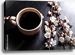 Постер Чашка кофе и ветка цветущей вишни