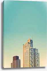Постер Верхушки небоскребов на фоне голубого неба