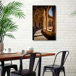 «Кастель-де-Беллвер, Пальма, Испания» в интерьере столовой в скандинавском стиле с кирпичной стеной