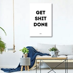 «Get shit done» в интерьере гостиной в скандинавском стиле над диваном