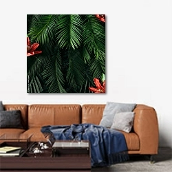 «Зеленые пальмовые листья и красные цветы» в интерьере современной гостиной над диваном