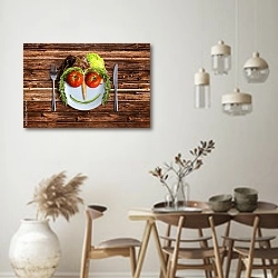 «Тарелка с овощным лицом» в интерьере кухни в стиле ретро над обеденным столом
