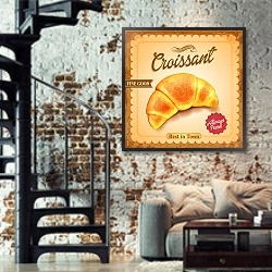 «Ретро плакат с круассаном» в интерьере двухярусной гостиной в стиле лофт с кирпичной стеной