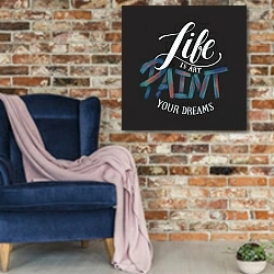 «Life is art paint your dreams » в интерьере в стиле лофт с кирпичной стеной и синим креслом