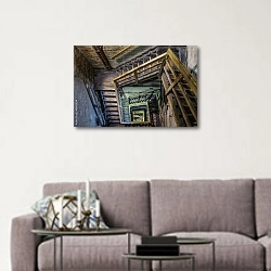 «Старая деревянная лестница в башне» в интерьере в скандинавском стиле над диваном
