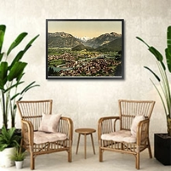 «Швейцария. Вид на город Интерлакен» в интерьере комнаты в стиле ретро с плетеными креслами