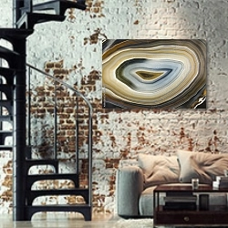 «Отполированый срез агата» в интерьере двухярусной гостиной в стиле лофт с кирпичной стеной