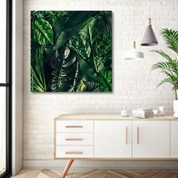 «Тропические зеленые листья» в интерьере комнаты в скандинавском стиле над тумбой