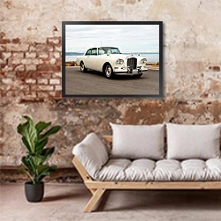 «Bentley S3 Continental Coupe by Mulliner & Park Ward '1964» в интерьере гостиной в стиле лофт над диваном