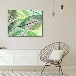 «Зеленые прозрачные листья» в интерьере белой комнаты в скандинавском стиле над комодом
