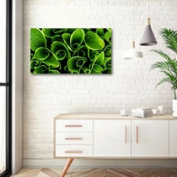 «Зеленые свежие свернутые листья» в интерьере комнаты в скандинавском стиле над тумбой