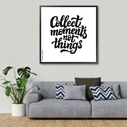 «Collect moments not things » в интерьере гостиной в скандинавском стиле с серым диваном