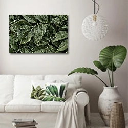 «Зеленые мокрые листья» в интерьере светлой гостиной в скандинавском стиле над диваном