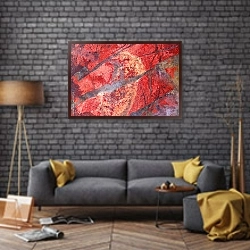 «Красная яшма» в интерьере в стиле лофт над диваном
