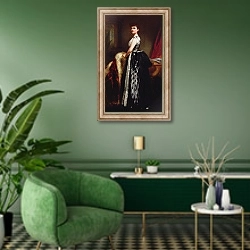 «Portrait of a young woman wearing a striped dress and standing in an interior» в интерьере гостиной в зеленых тонах