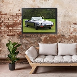 «Jaguar E-Type V12 Roadster (Series III) '1971–75» в интерьере гостиной в стиле лофт над диваном