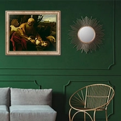 «The Sacrifice of Isaac, 1603» в интерьере классической гостиной с зеленой стеной над диваном